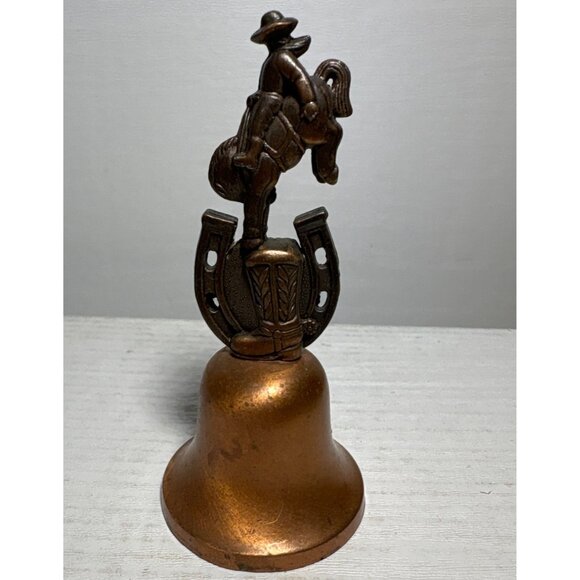 Vintage Wyoming Souvenir Copper Bell With Cowboy & Bucking Horse Horseshoe - Picture 3 of 7